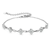 Delicate silver bracelet with floral-shaped diamond clusters, a stunning Moissanite diamond bracelet