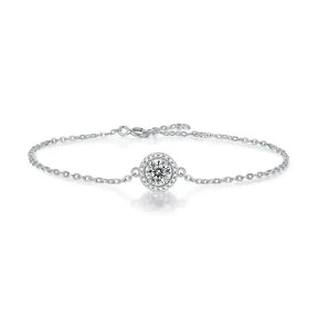 Delicate silver moissanite diamond bracelet with a round diamond-encrusted centerpiece