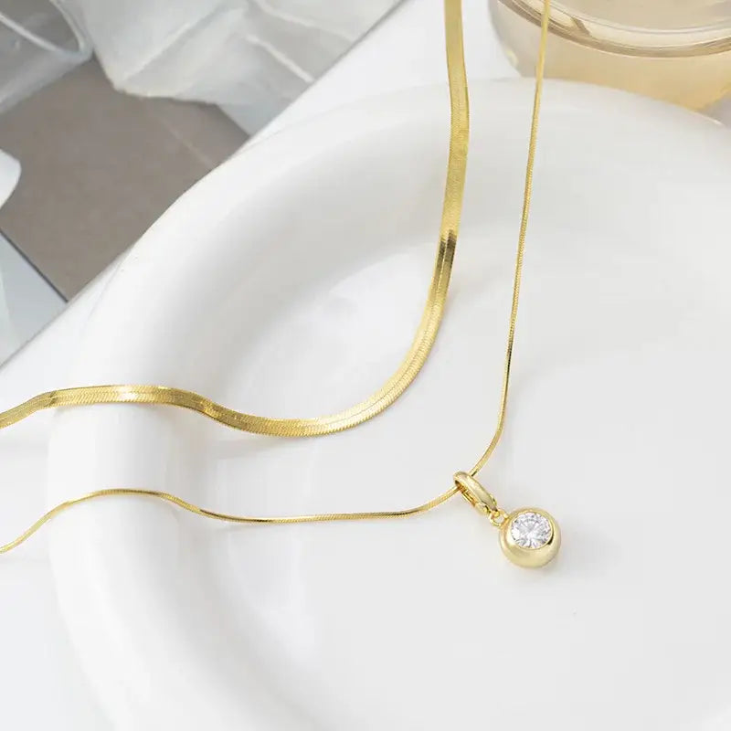 Gold necklace featuring a 1CT Moissanite Diamond pendant in S925 Sterling Silver