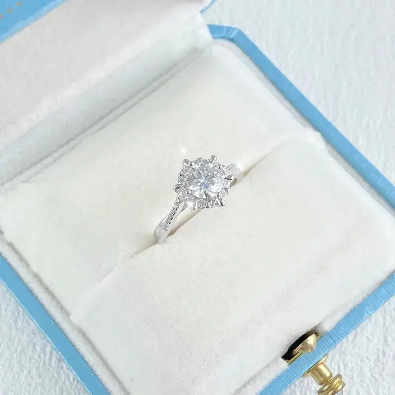 Diamond engagement ring featuring a 1ct Moissanite diamond in 18k white gold setting