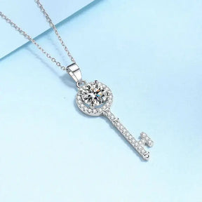 Sparkling key-shaped pendant necklace featuring 1ct Moissanite in elegant silver