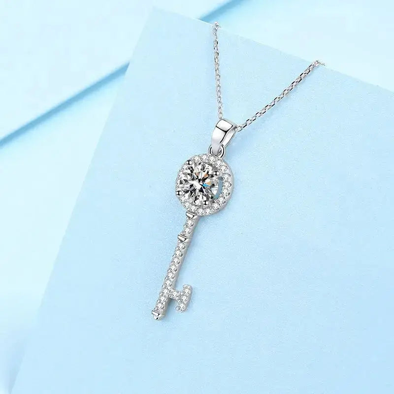 Sparkling silver necklace key pendant with gemstone accents and 1ct Moissanite