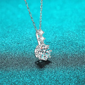 Delicate sterling silver Moissanite necklace featuring a sparkling D color gem pendant