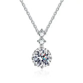 Sterling silver necklace featuring a round diamond pendant with a dazzling Moissanite stone