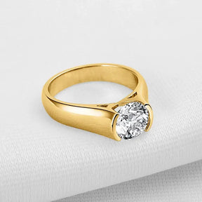 Gold engagement ring featuring a round solitaire diamond in 2-Carat Moissanite Ring design