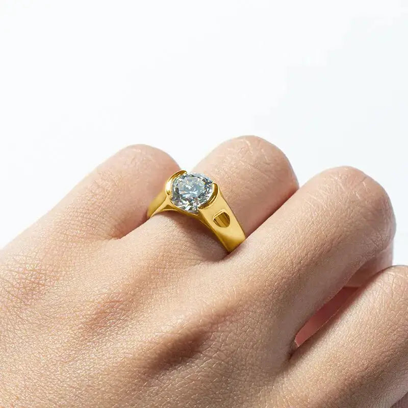 Gold ring with an oval-cut diamond, highlighting the 2-carat Moissanite Ring in Sterling Silver Elegance