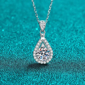 Teardrop-shaped 2CT Moissanite Diamond Pendant on a silver chain for elegant weddings