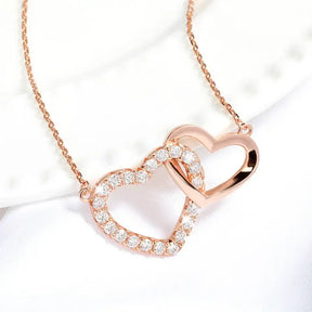 Rose gold double heart moissanite necklace with diamond outline pendants