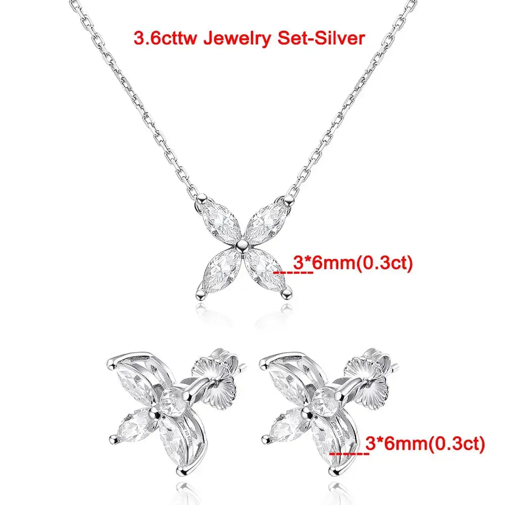 Silver jewelry set featuring floral pendant and stud earrings with marquise-cut moissanite stones