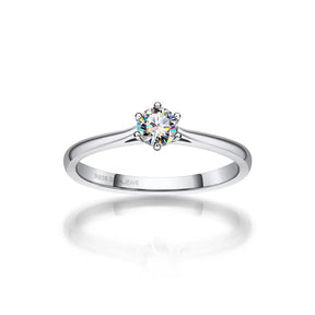 Solitaire diamond engagement ring featuring a 4mm Moissanite silver band and elegant 18k gold