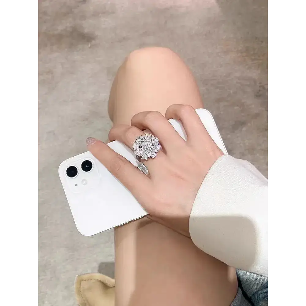 Diamond engagement ring on hand with smartphone showcasing 5CT Moissanite Ring Big Diamond Elegance