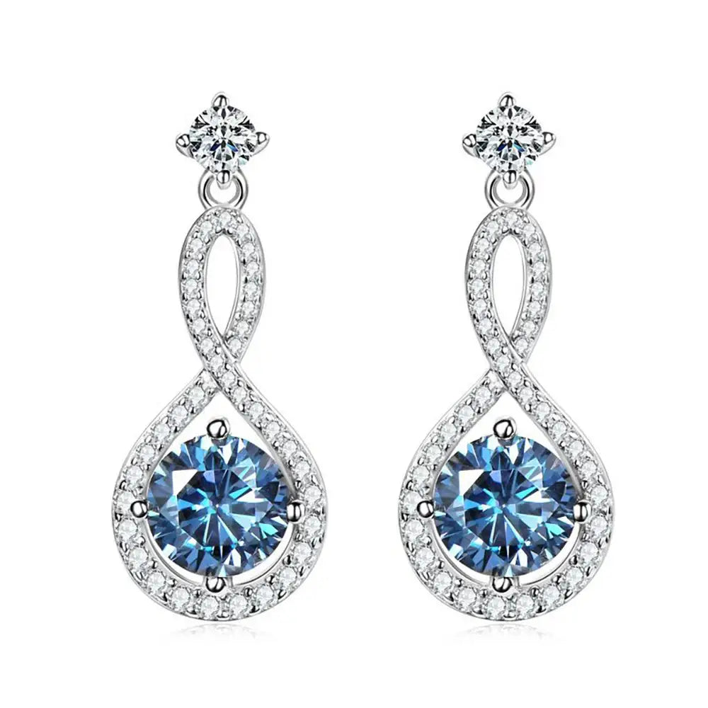 Elegant silver dangle earrings with blue gemstones and lab grown diamond accents