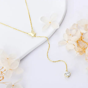 Delicate gold necklace featuring a Lab Grown Diamond Butterfly Pendant with crystal pendant