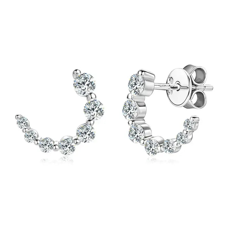 Curved silver C-shape tapering earrings showcasing elegant lab grown diamonds