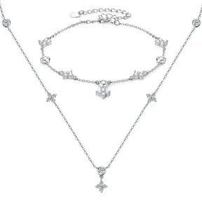 Delicate sterling silver clover jewelry set with cross pendants and crystal accents