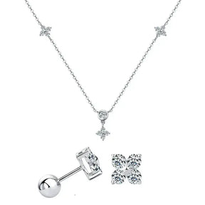 Elegant silver four leaf clover jewelry with star-shaped diamond accents and pendant