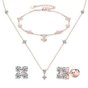 Rose gold jewelry set of necklace, bracelet, and earrings in sterling silver clover style