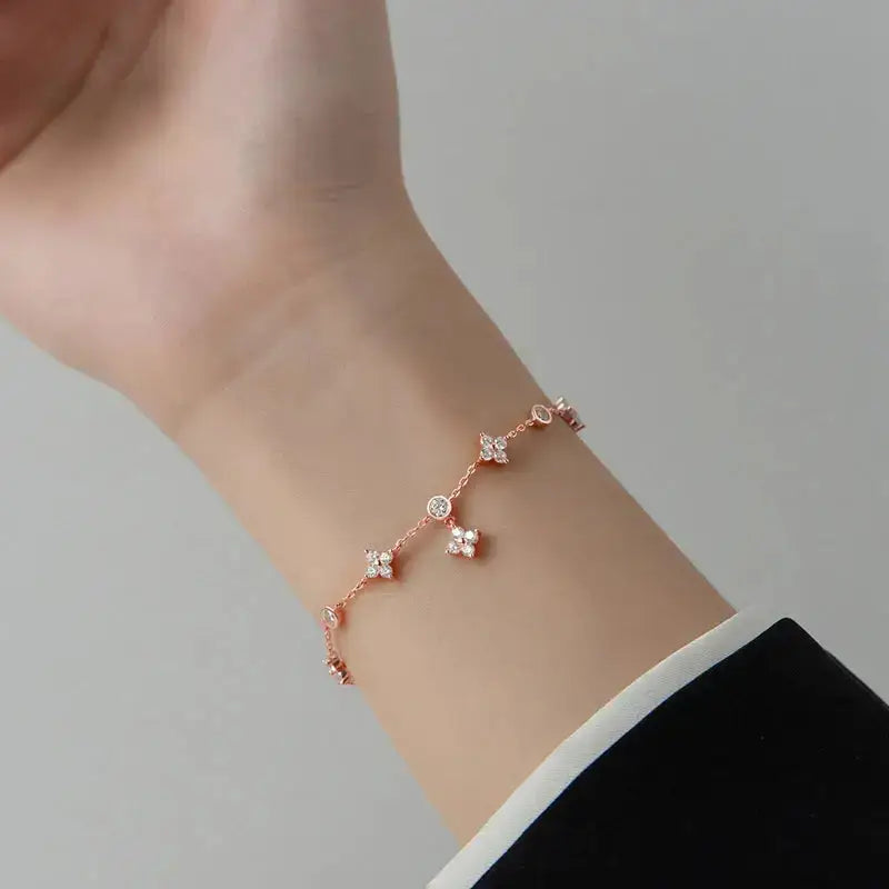 Delicate rose gold bracelet with star charms for the Sterling Silver Clover Jewelry Set