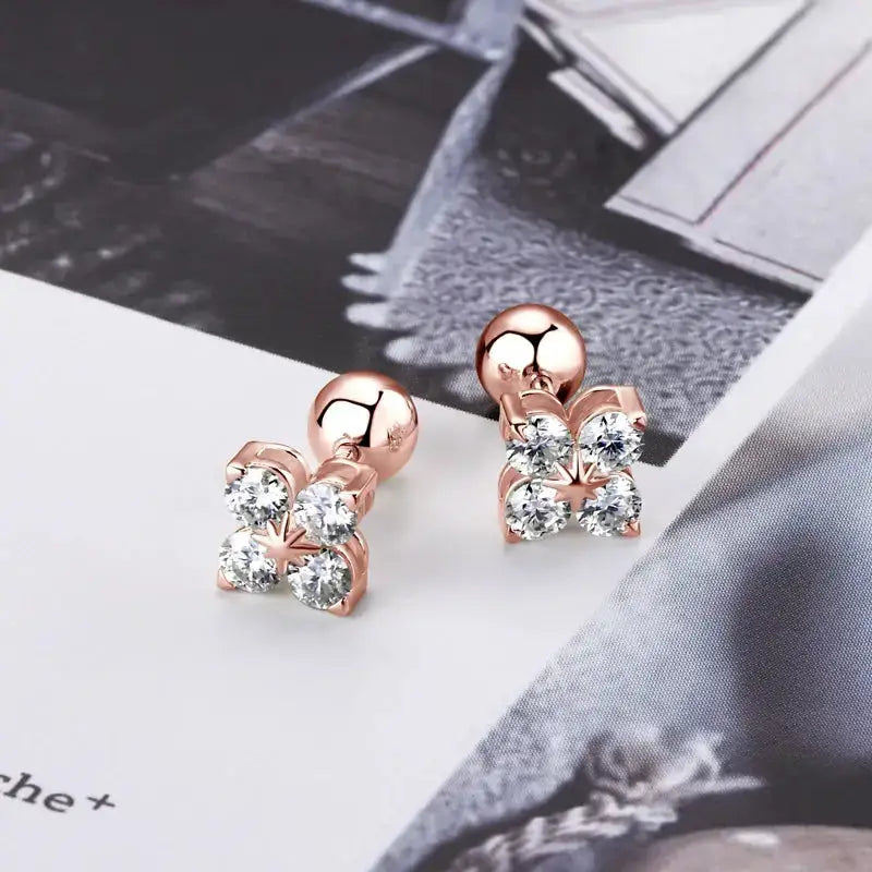 Rose gold earrings with diamond-like crystals in a sterling silver clover jewelry set