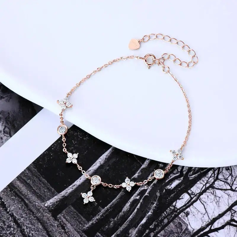 Delicate rose gold bracelet with floral charms from 925 Silver Four Leaf Clover Jewelry Set