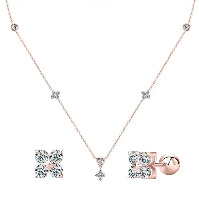 Delicate rose gold necklace and stud earrings from the Silver Four Leaf Clover Jewelry Set