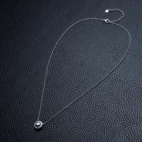 Delicate silver Moissanite pendant on a necklace from Telles Jewelry, showcasing elegance