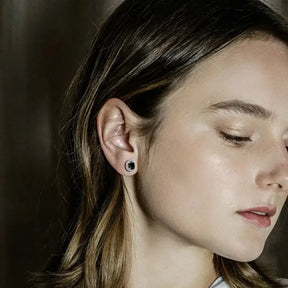 Close-up profile of a young woman showcasing the 925 Silver Moissanite Pendant Necklace