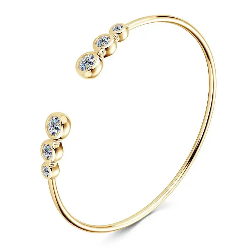 Gold open cuff bracelet with diamond-like stones on a 925 Sterling Silver Adjustable Bracelet