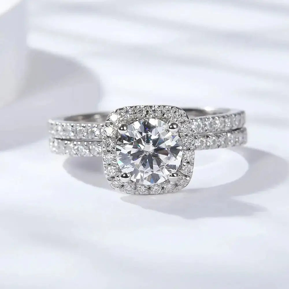 Diamond engagement ring with cushion halo and split shank band in sterling silver brilliant moissanite