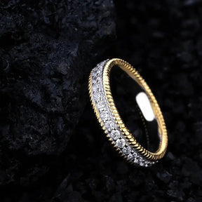 Gold ring featuring small diamonds on a band of 925 Sterling Silver Created Moissanite