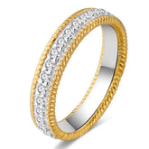 Gold and diamond wedding band with intricate rope-like edges in sterling silver created moissanite