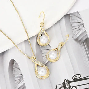 Gold-toned infinity design sterling silver pearl jewelry set with teardrop pendants