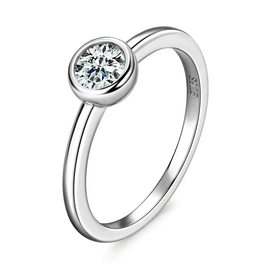 Silver bezel moissanite ring featuring a round solitaire diamond in 925 sterling silver