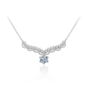 Elegant silver 0.5 Carat Moissanite Pendant with diamond and filigree design by Telles Jewelry