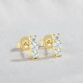 Gold stud earrings with three diamonds, part of an Elegant Silver Jewelry Set with Moissanite Stones