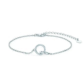 Delicate silver chain bracelet featuring a circular pendant with lab grown diamonds