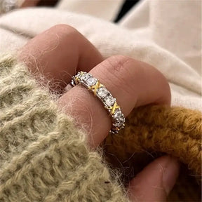 Elegant Moissanite Eternity Ring in D Color, S925 Sterling Silver worn on a finger