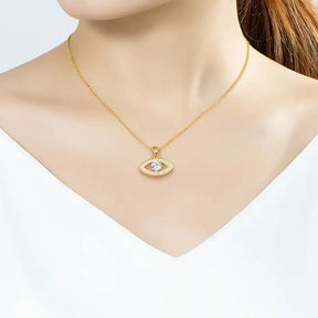 Gold eye pendant necklace featuring a blue gemstone and a lab grown diamond charm