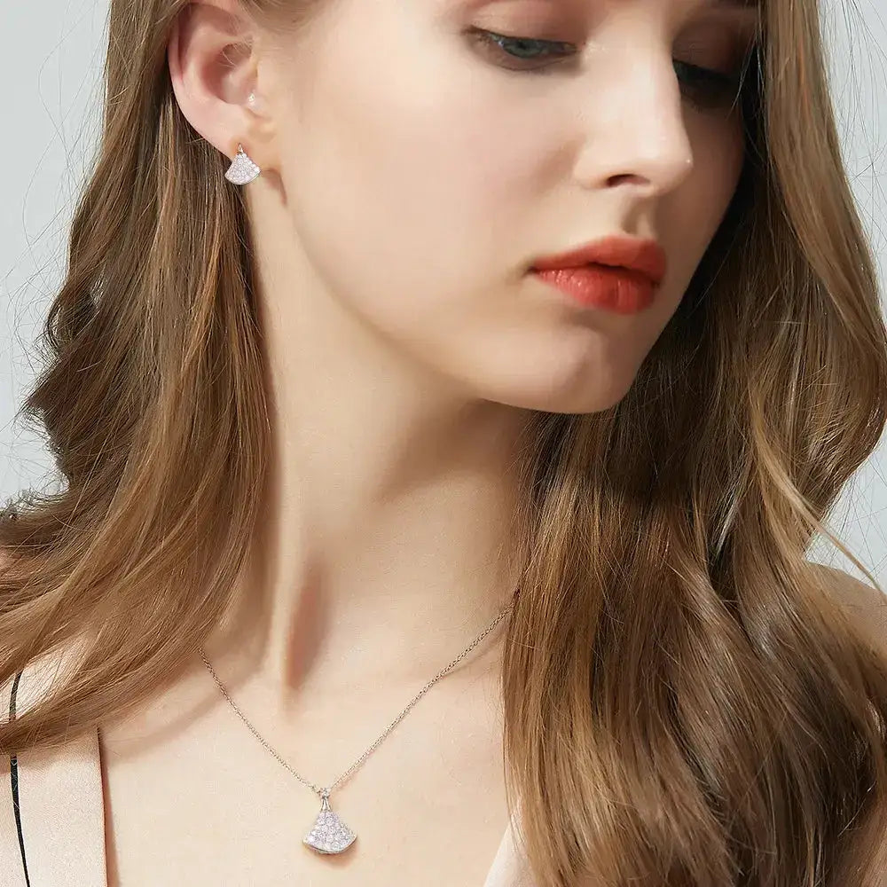 Woman with long brown hair showcasing a Fan-Shaped Moissanite Diamond Jewelry Set