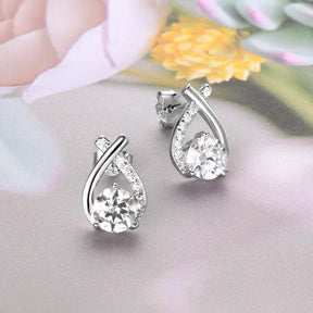 Elegant teardrop-shaped diamond earrings in silver, perfect for trendy wear