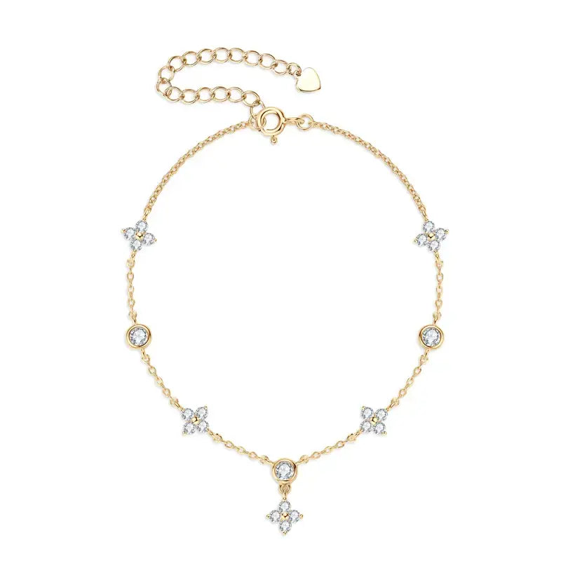 Delicate gold chain anklet with crystal flower charms from Four-Leaf Clover Bracelet collection