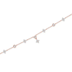 Delicate rose gold Four-Leaf Clover Bracelet with lab grown diamonds and charms