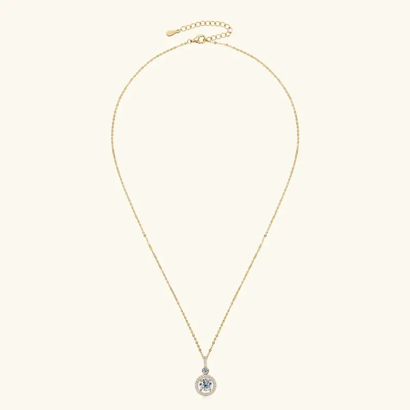 Gold-toned lab grown diamond pendant necklace with circular blue gemstone accent