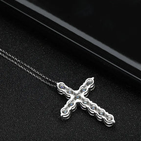 Silver cross pendant necklace featuring a chain-link design with Moissanite accents