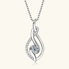 Elegant silver pendant necklace with lab grown diamond and central gemstone detail