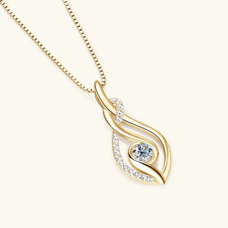 Gold pendant necklace with teardrop design, featuring lab grown diamonds and a blue gemstone