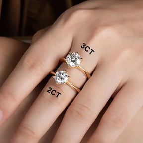 Two diamond solitaire rings on hand labeled 2CT and 3CT for Gold Plated Moissanite Engagement Ring