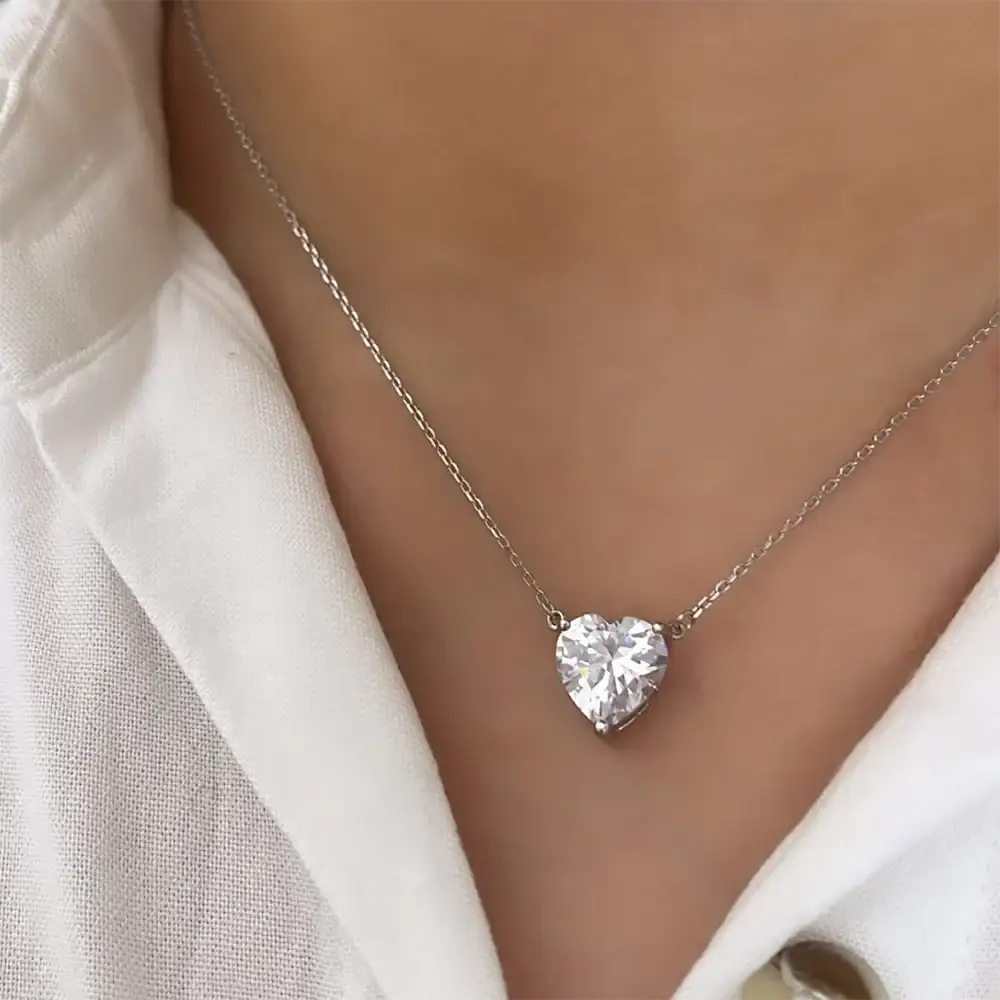 Heart-shaped diamond pendant on silver chain in Heart Moissanite Jewelry set