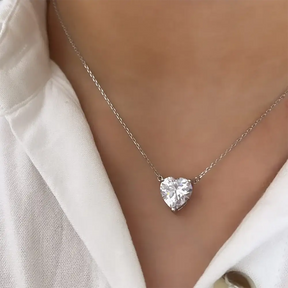 Heart-shaped diamond pendant on silver chain in Heart Moissanite Jewelry set