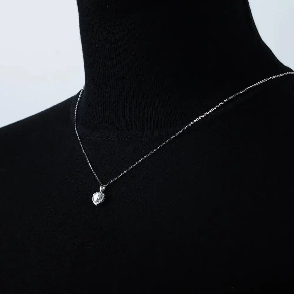 Silver Necklace with Heart Moissanite Pendant on Black Display Form - Elegant Design